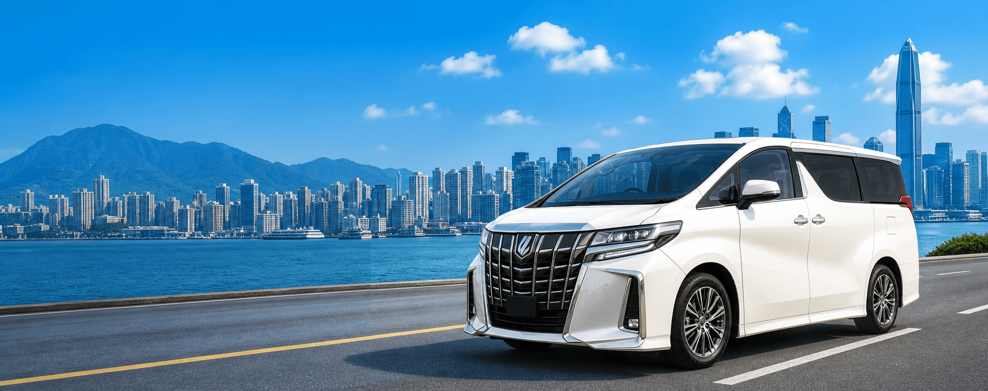 White 7-seater MPV by the Hong Kong waterfront with the Shenzhen skyline behind it